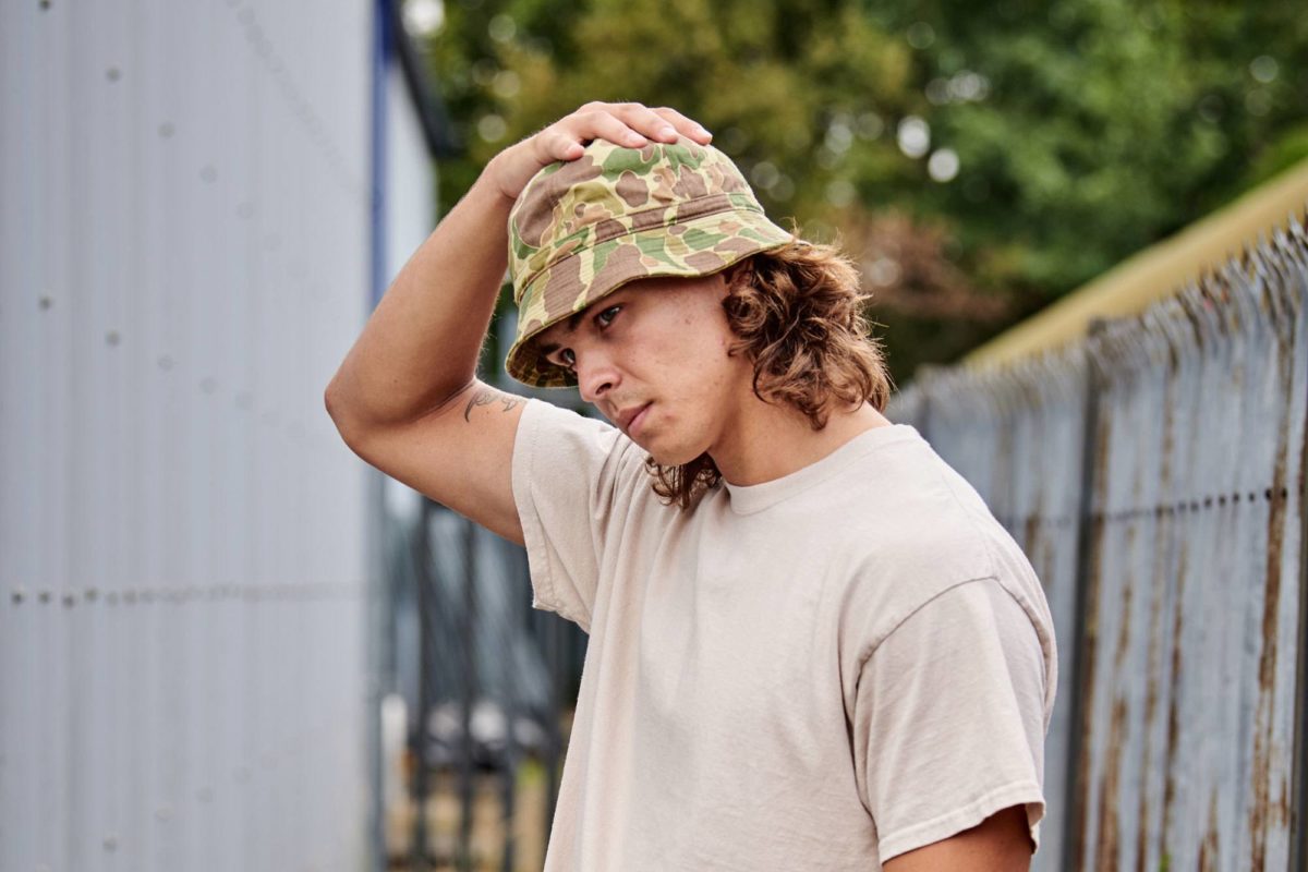 Outdoor shot of a Frogskin Camo hat