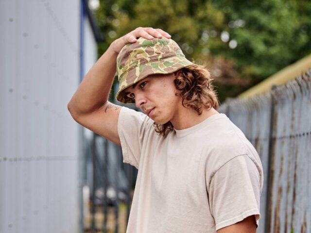 Outdoor shot of a Frogskin Camo hat