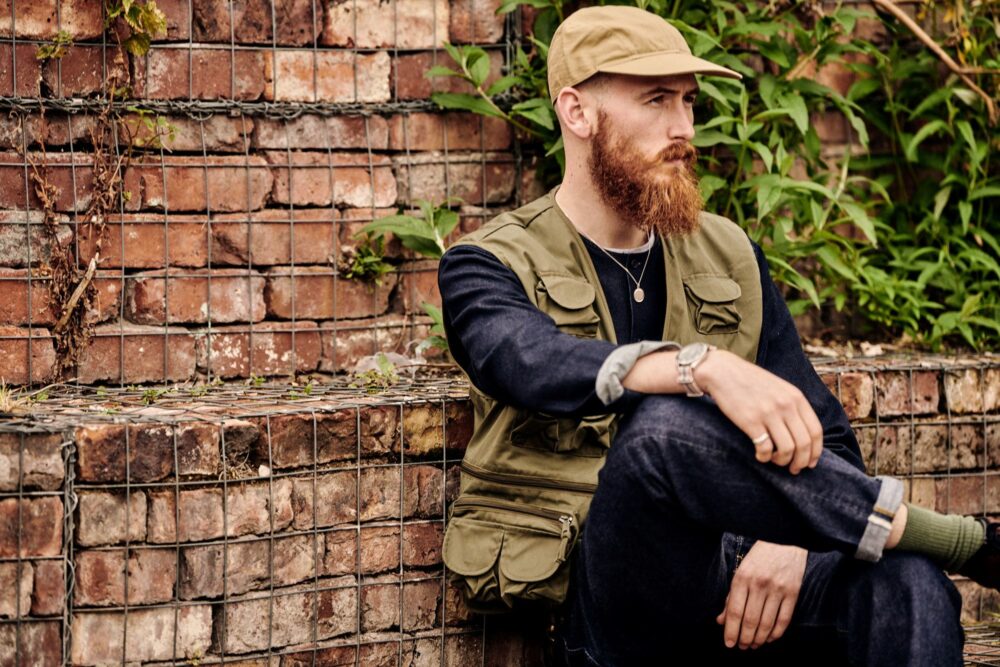 Chris wearing a reworking of the iconic B-1 Flight Cap