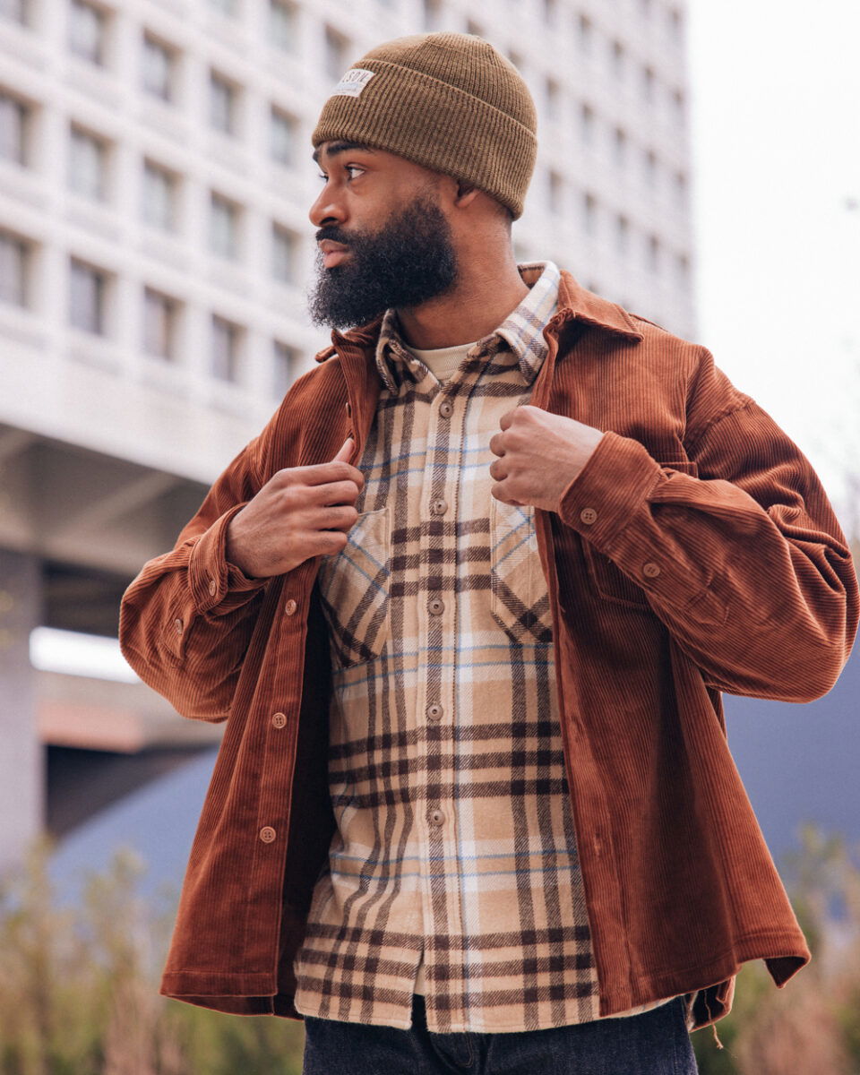 The Gypsy & Sons Corduroy Jacket layered with a flannel from Seuvas and a Filson Watch Cap