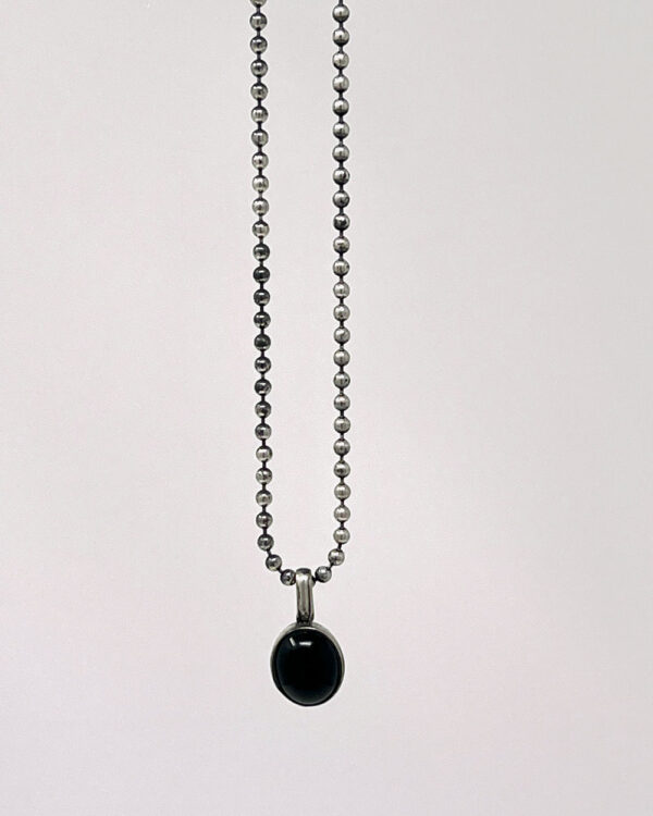 Red Rabbit Trading Co. Onyx Oval Charm